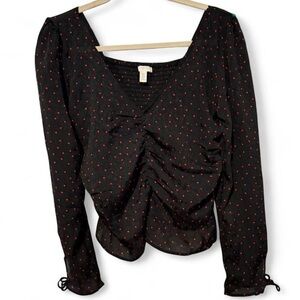 H&M black & red heart print blouse with bow detail and ruched front. Size L